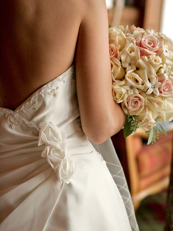 A bride wearing a beautiful wedding dress under $1000